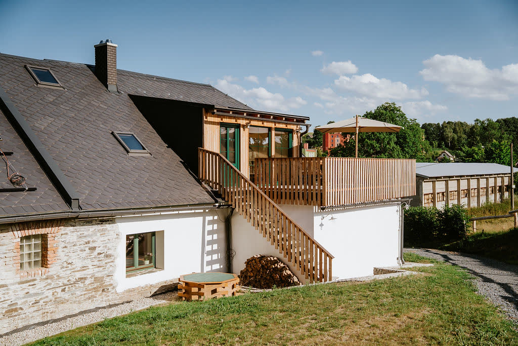 White facade of the old Polňačka cottage