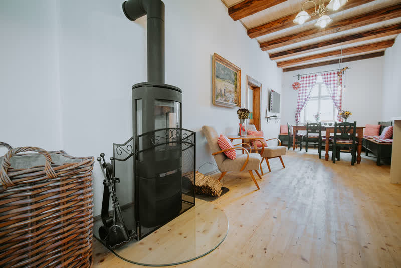 Tiled wood-burning stove at Polňačka Cottage