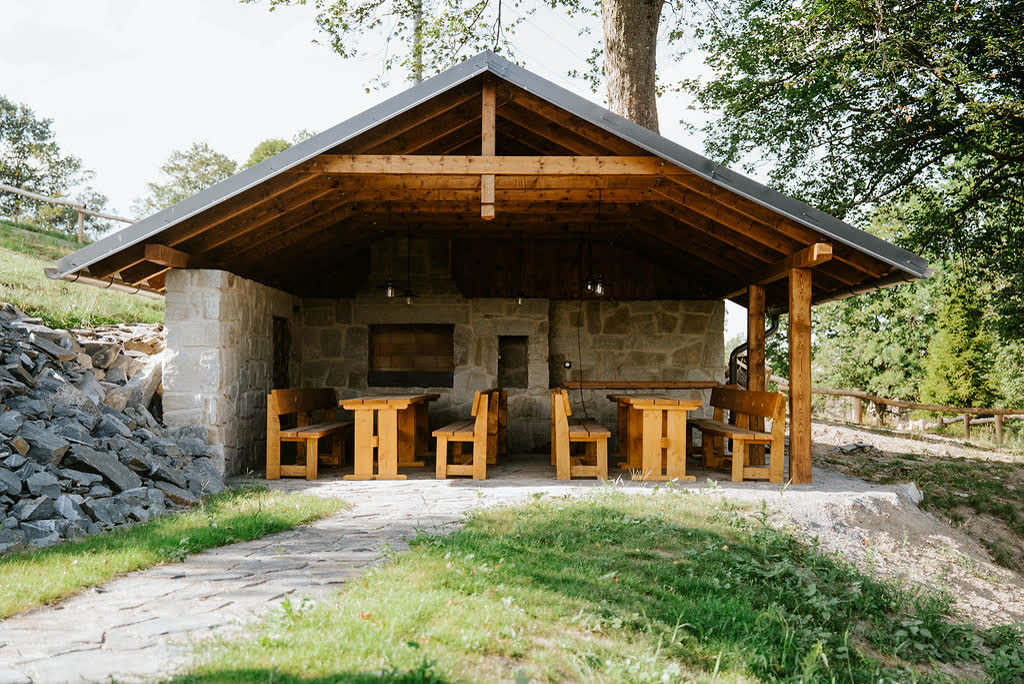 Covered outdoor kitchen with grill